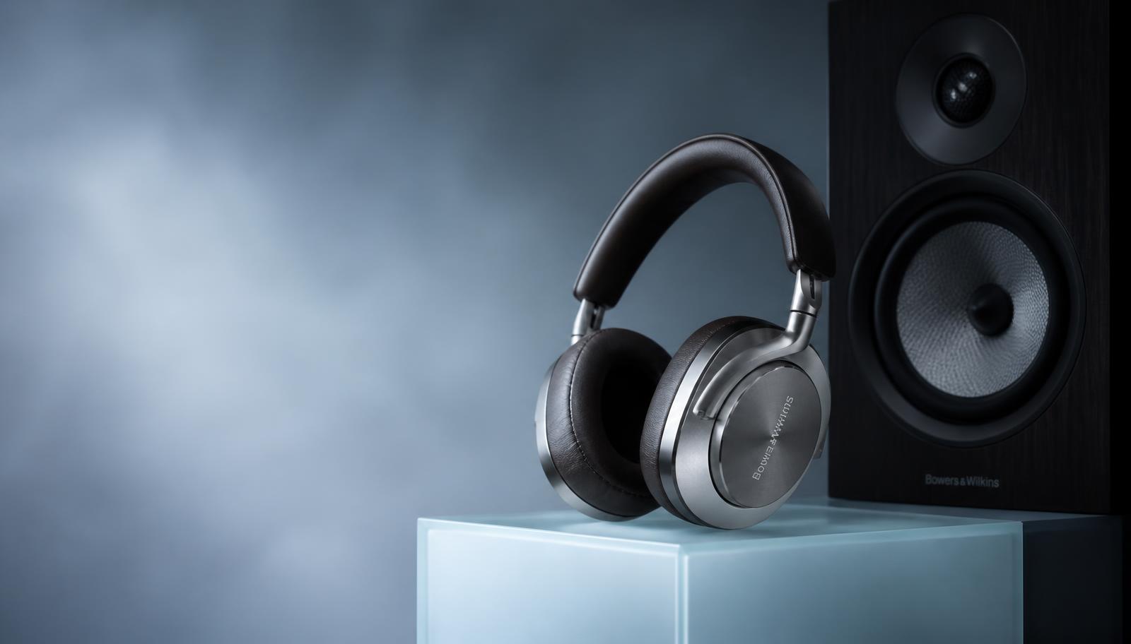 Bowers & Wilkins reference headphones beside a premium bookshelf speaker